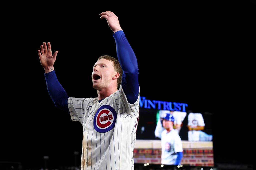 Chicago Cubs' Pete Crow-Armstrong gestures toward the crowd after hitting a walkoff home run during the 10th inning of a baseball game to defeat the Chicago White Sox in Chicago, Monday, Aug. 17, 2026. (AP Photo/Jessie Alcheh)