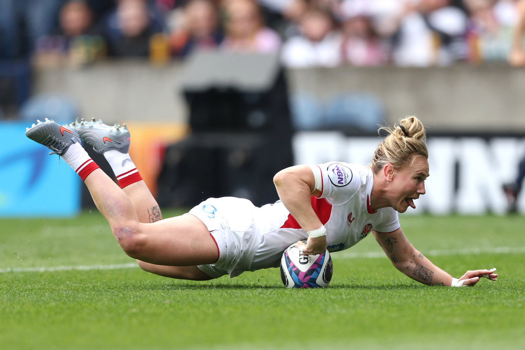 England's Megan Jones scores a try during the Women's Six Nations rugby match between Scotland and England in Edinburgh, Scotland, Saturday April 18, 2026. (Ewan Bootman/PA via AP)