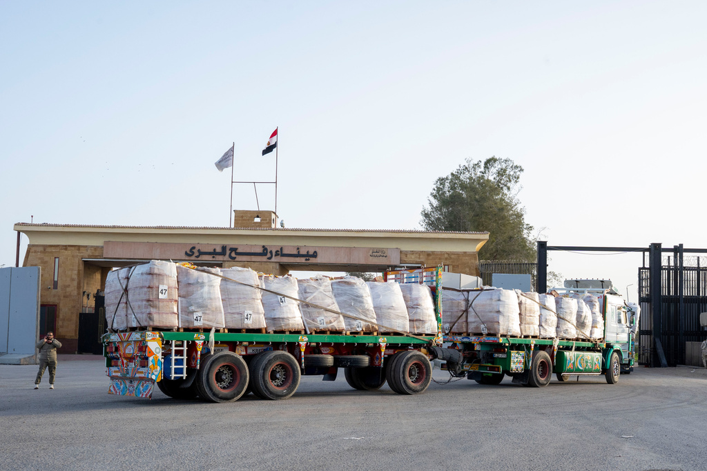 A truck enters the Egyptian gate of the Rafah crossing, heading for inspection by Israeli authorities before entering the Gaza Strip, Tuesday, Jan. 27, 2026. (AP Photo/Mohamed Arafat)