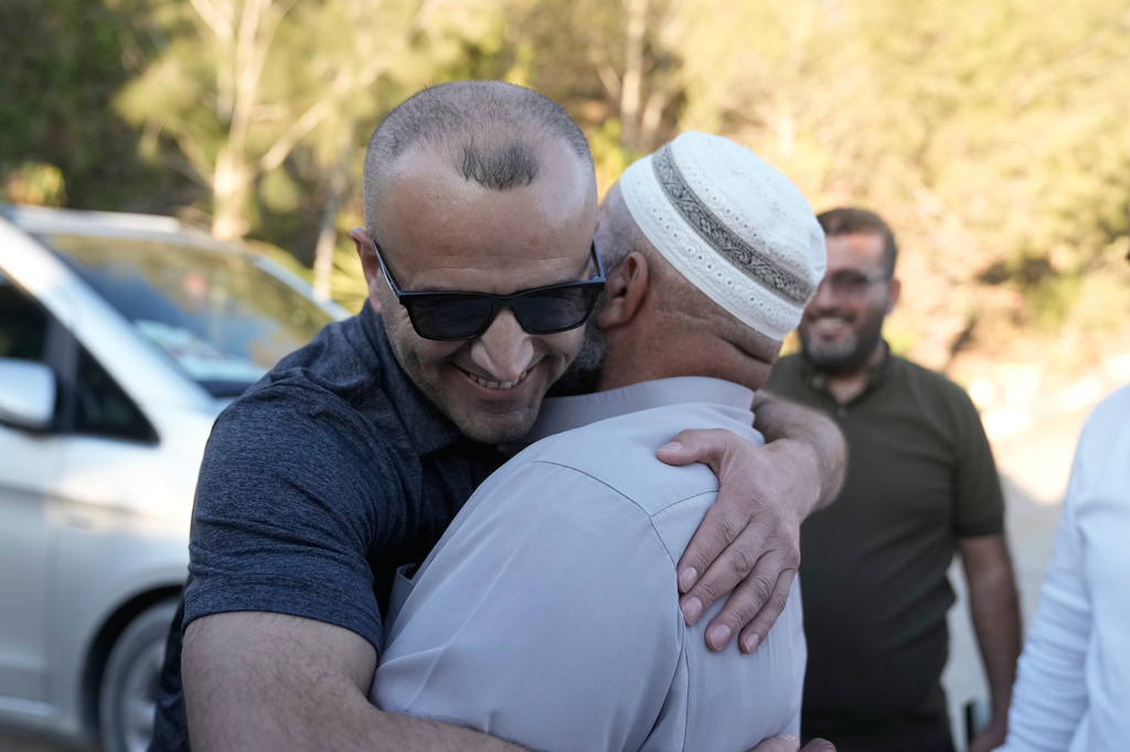Loui Ridi, an Ohio-based Palestinian-American landlord of one of the homes besieged by Israeli settlers for over a week, arrives at his parent's home upon return from the U.S., in the occupied West Bank village of Qusra, south of Nablus, Monday, Aug. 17, 2026. (AP Photo/Majdi Mohammed)