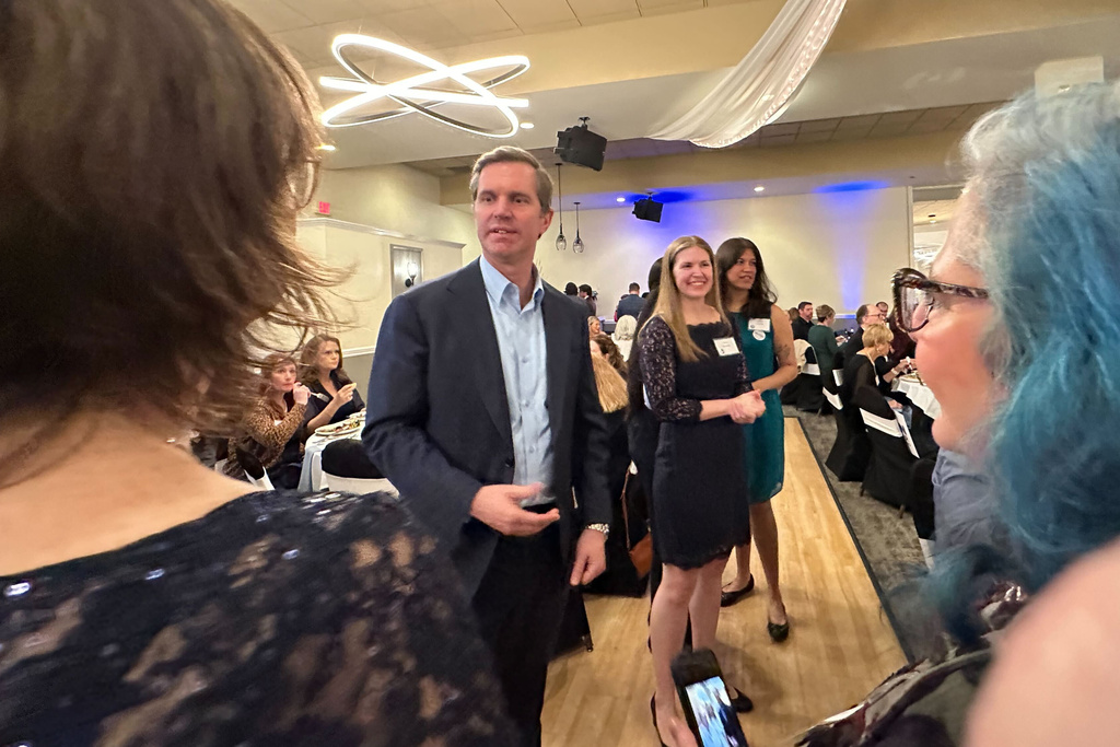 Kentucky Gov. Andy Beshear mingles with the audience at a Democratic fundraiser in Butler County, Ohio, March 21, 2026. (AP Photo/Julie Carr Smyth)