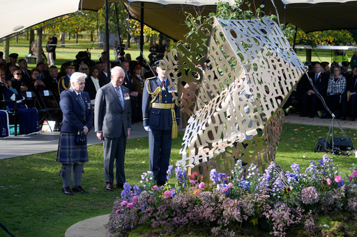 King Charles III stands during a visit to the National Memorial Arboretum in Alrewas, Staffordshire, for the dedication ceremony of the LGBT+ Armed Forces memorial, the UK's first national memorial commemorating LGBT+ people who have served and continue to serve in the military, Monday, Oct. 27, 2025. (Peter Byrne/PA via AP) King Charles III stands during a visit to the National Memorial Arboretum in Alrewas, Staffordshire, for the dedication ceremony of the LGBT+ Armed Forces memorial, the UK's first national memorial commemorating LGBT+ people who have served and continue to serve in the military, Monday, Oct. 27, 2025. (Peter Byrne/PA via AP)
