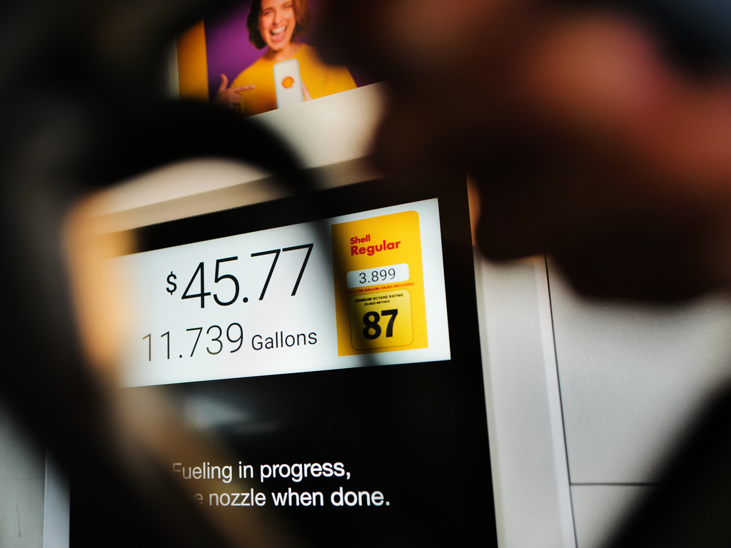 Gas purchase price is displayed on a fuel pump at a gas station in Buffalo Grove, Ill., Thursday, March 19, 2026. (AP Photo/Nam Y. Huh)