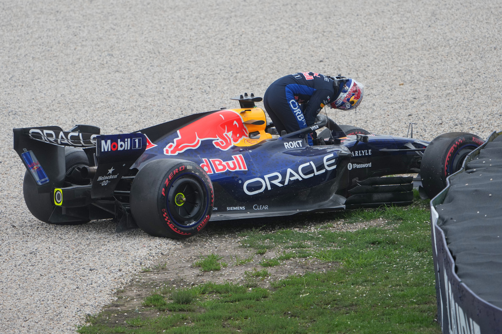 Red Bull driver Max Verstappen of the Netherlands gets out of his car after a crash during the qualifying session for the Australian Formula One Grand Prix at Albert Park, in Melbourne, Australia, Saturday, March 7, 2026. (AP Photo/Asanka Brendon Ratnayake)