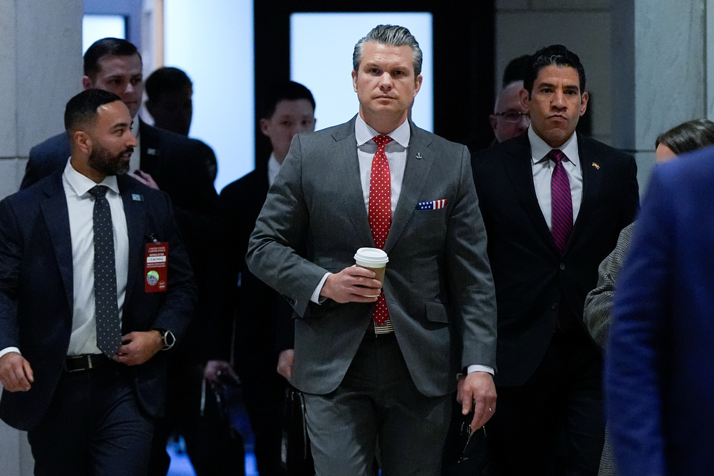 Defense Secretary Pete Hegseth arrives to brief members of Congress on military strikes near Venezuela, Tuesday, Dec. 16, 2025, at the Capitol in Washington. (AP Photo/Julia Demaree Nikhinson)