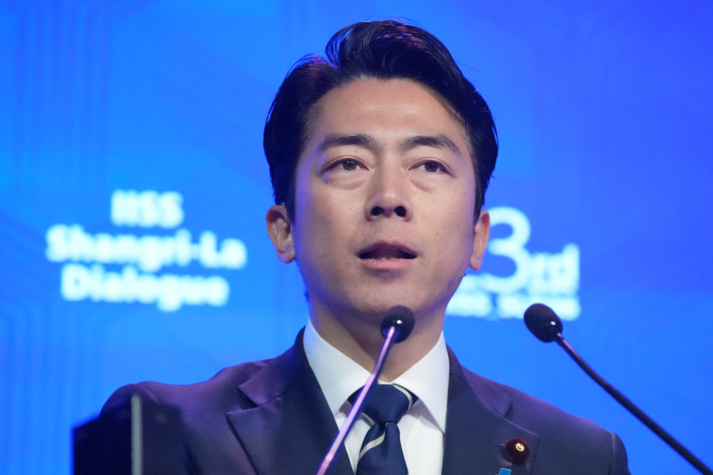 Japan's Defense Minister Shinjiro Koizumi delivers a speech during the Shangri-La Dialogue, Asia's annual defense and security forum, in Singapore, Sunday, May 31, 2026. (AP Photo/Achmad Ibrahim)