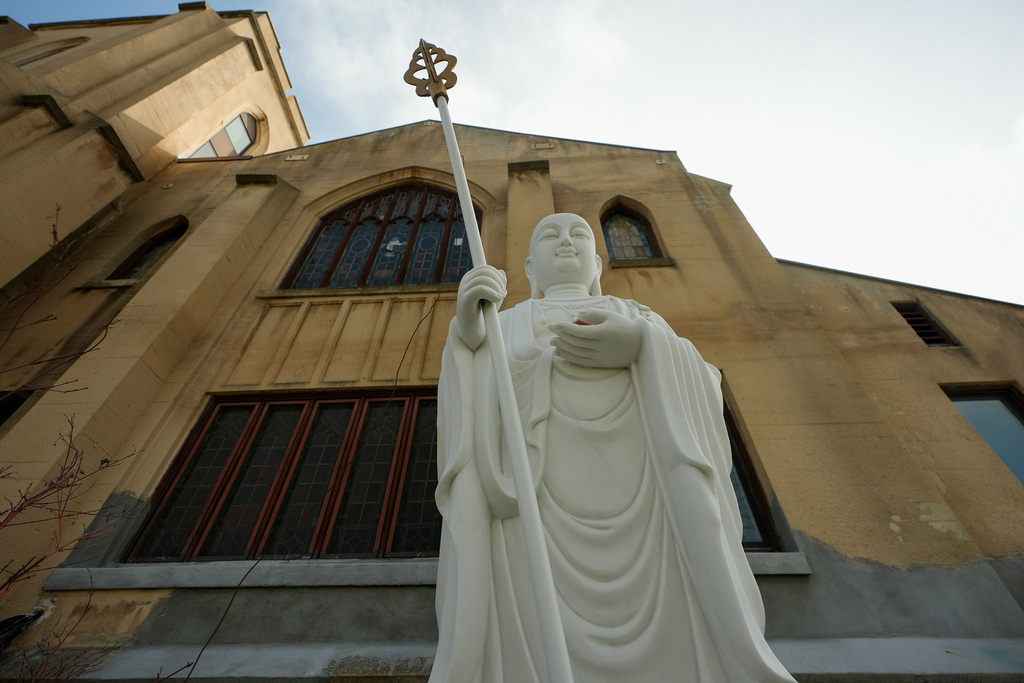 A Buddha statue is displayed outside at Wei Mountain Temple, in Rosemead, Calif., Saturday, Feb. 17, 2024. (AP Photo/Damian Dovarganes)