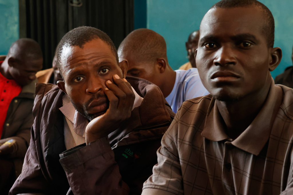 Worried parents of abducted school children gather at the St. Mary's Catholic Primary and Secondary School in Papiri community, Nigeria, Friday, Nov. 28, 2025. (AP Photo )