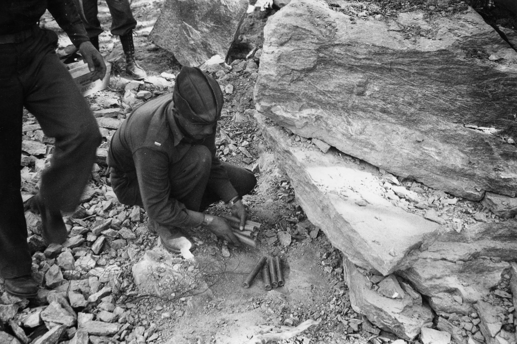 FILE - In this 1942 photo provided by the U.S. Army Corps of Engineers Office of History, a Black soldier places dynamite during construction of the Alaska Highway in the Northern Sector of Alaska. (U.S. Army Corps of Engineers Office of History via AP, File)