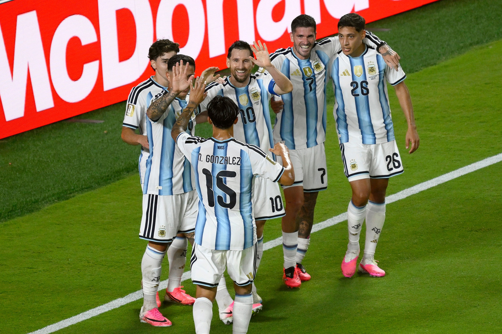 Argentina's Lionel Messi (10) celebrates with teammates after scoring their third goal during the World Cup Group J soccer match between Argentina and Algeria in Kansas City, Mo., Tuesday, June 16, 2026. (AP Photo/Reed Hoffmann)
