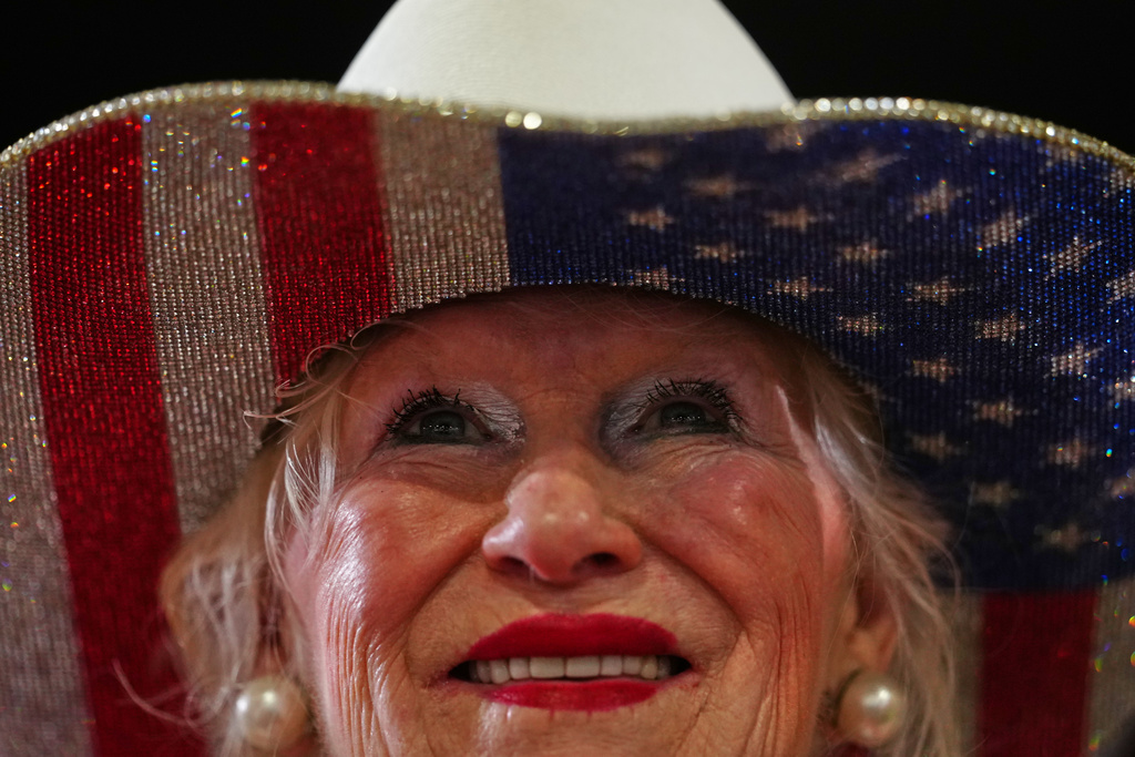 A supporters listens to President Donald Trump speaks at Verst Logistics Wednesday, March 11, 2026, in Hebron, Ky. (AP Photo/Julia Demaree Nikhinson)