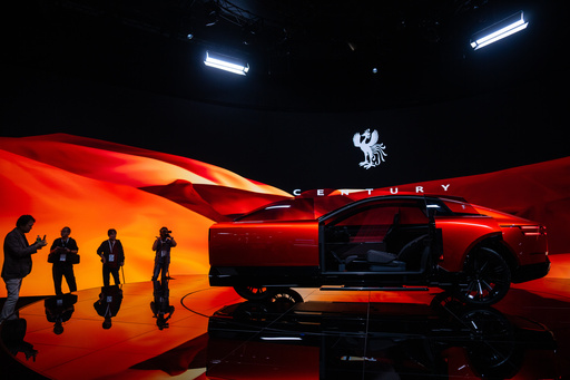 Members of the media and guests look at a Century's concept model during the press day of the Japan Mobility Show, in Tokyo, Thursday, Oct. 30, 2025. (AP Photo/Louise Delmotte) Members of the media and guests look at a Century's concept model during the press day of the Japan Mobility Show, in Tokyo, Thursday, Oct. 30, 2025. (AP Photo/Louise Delmotte)