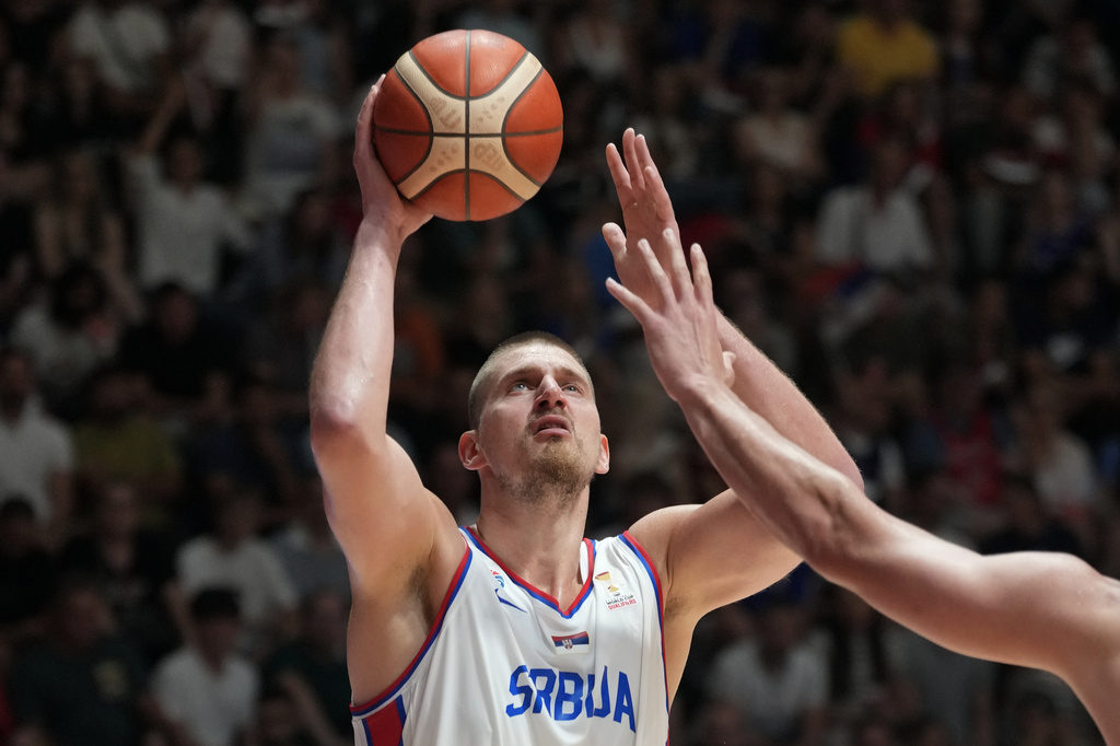 Serbia's Nikola Jokic tries to score as Bosnia's Luka Garza blocks him during their FIBA Basketball World Cup 2027 European qualifiers match between Serbia and Bosnia, in Belgrade, Serbia, Monday, July 6, 2026. (AP Photo/Darko Vojinovic)