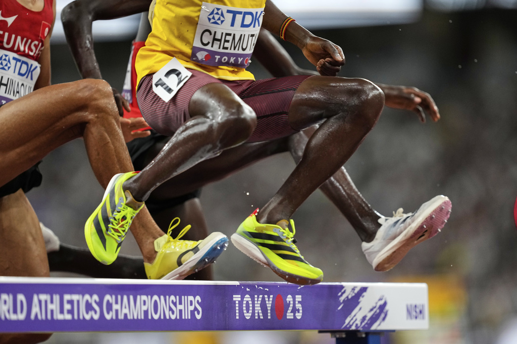 Uganda's Leonard Chemutai clears a barrier during a men's 3,000 meters steeplechase heat at the World Athletics Championships in Tokyo, Saturday, Sept. 13, 2025. (AP Photo/Petr David Josek)