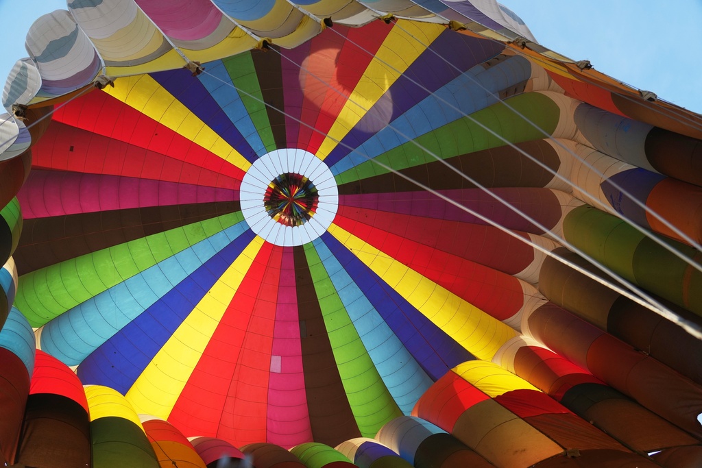 A colorful hot air balloon lands on the west bank of the Nile River in Luxor, Egypt, Oct. 4, 2025. (AP Photo/Amr Nabil)