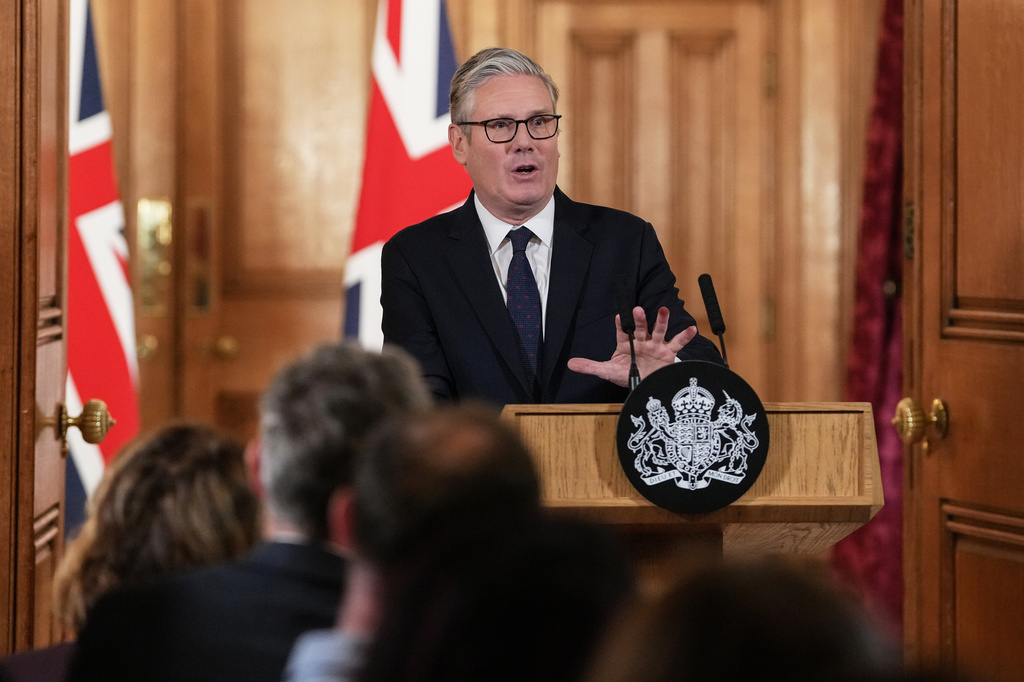 Britain's Prime Minister Keir Starmer attends a press conference to announce government action to protect children online, at Downing Street in central London, Monday, June 15, 2026. (Carlos Jasso/ Pool Photo via AP)