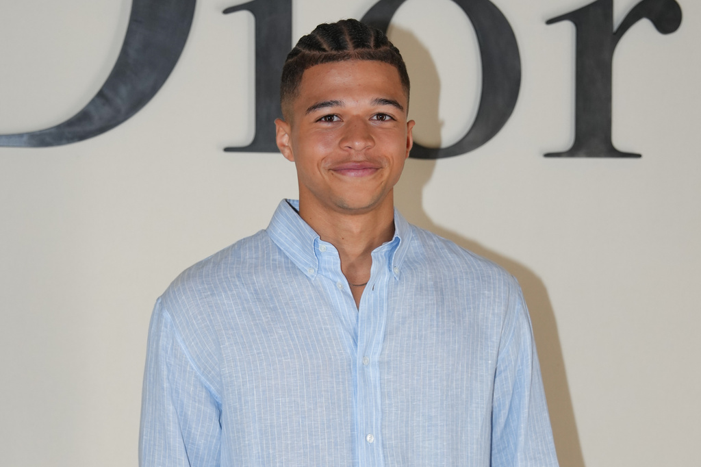 Dylan Ennis poses for photographers at the photo call for the Dior Homme Spring Summer 2027 collection presented in Paris, France, Wednesday, June 24, 2026. (AP Photo/Aurelien Morissard)