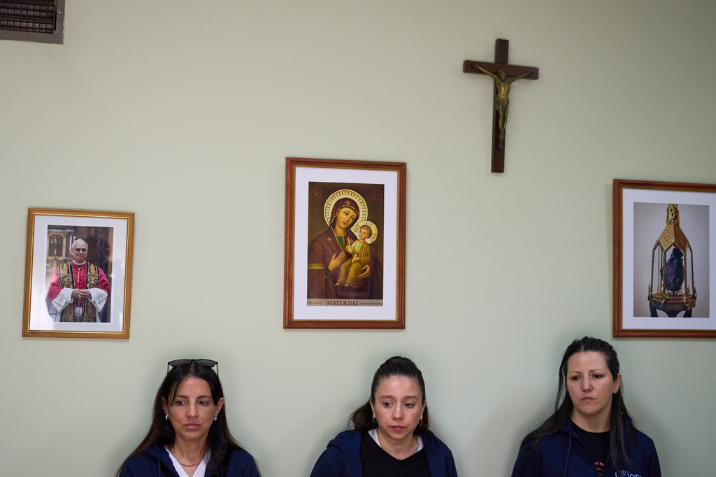 Employees attend a meeting at the Pequeño Cottolengo Don Orione, a home for people with disabilities that will be visited by Pope Leo XIV in November, in Buenos Aires, Argentina, Thursday, Sept. 24, 2026. (AP Photo/Rodrigo Abd)