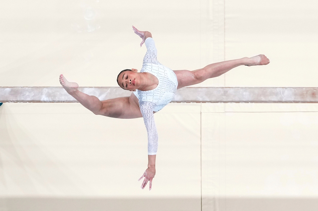 FILE - Suni Lee, of the United States, performs on the beam during the women's artistic gymnastics individual balance beam finals in Bercy Arena during the 2024 Summer Olympics, Aug. 5, 2024, in Paris. (AP Photo/Morry Gash, File)