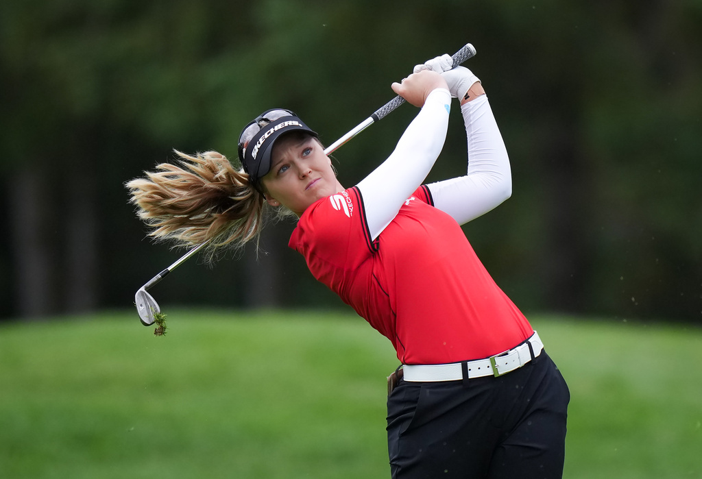 Canada's Brooke Henderson hits her second shot on the fourth hole during the first round at the LPGA Canadian Women's Open golf tournament in Edmonton, Alberta, Thursday, Aug. 20, 2026. (Darryl Dyck/The Canadian Press via AP)
