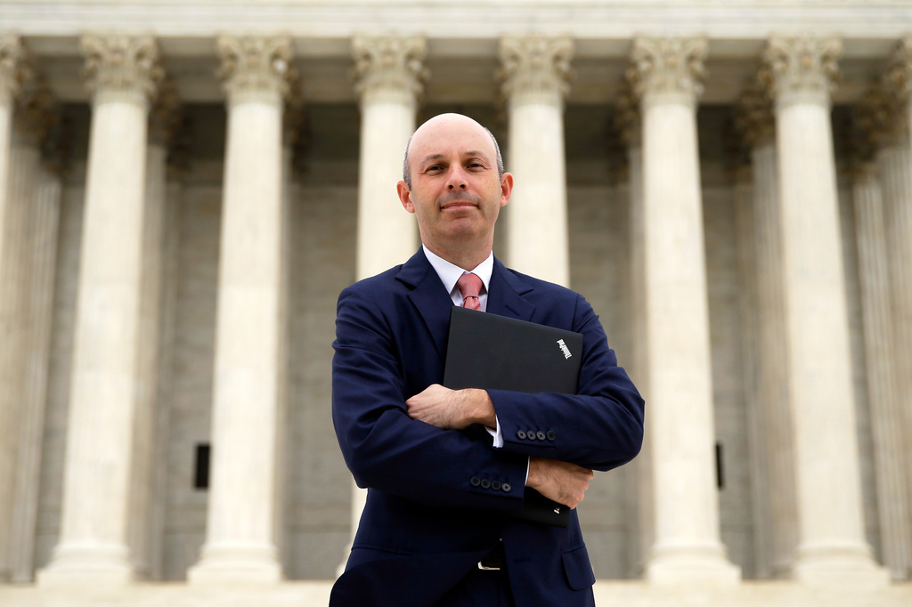 FILE - Tom Goldstein, who writes SCOTUSblog.com, poses for a photograph in front of the Supreme Court, Oct. 31, 2013, in Washington. (AP Photo/Alex Brandon, File)