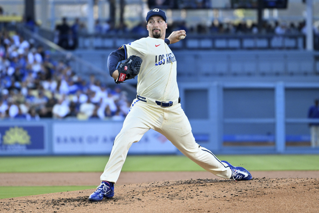 Los Angeles Dodgers pitcher Blake Snell throws against the San Diego Padres during the second inning of a baseball game Saturday, Aug. 16, 2025, in Los Angeles. (AP Photo/Wally Skalij)