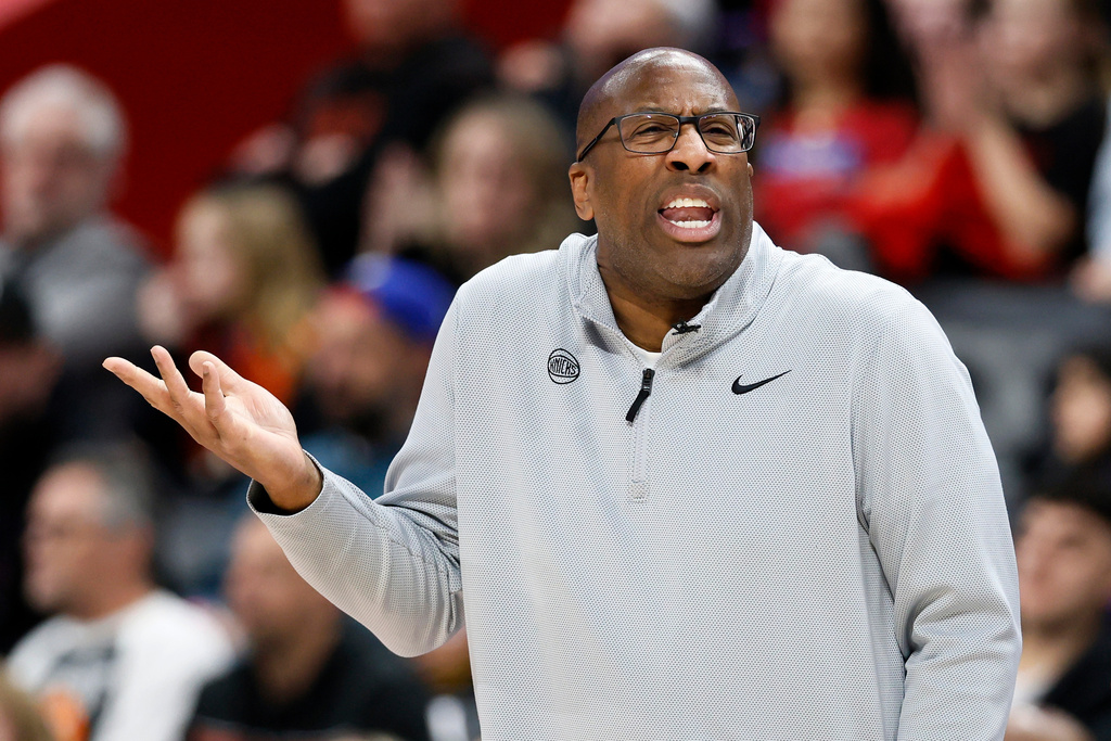 New York Knicks head coach Mike Brown gestures to an official after his team was whistled for a foul during the second half of an NBA basketball game against the Detroit Pistons, Friday, Feb. 6, 2026, in Detroit. (AP Photo/Duane Burleson)