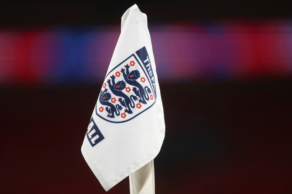 FILE - A corner flag with the England logo on it ahead of the World Cup 2022 group I qualifying soccer match between England and San Marino at Wembley stadium in London, Thursday March 25, 2021. (Carl Recine/Pool Photo via AP, File)