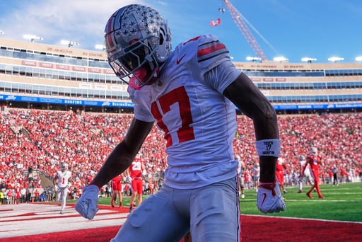 Ohio State's Carnell Tate celebrates his touchdown catch during the first half of an NCAA college football game against the Wisconsin Saturday, Oct. 18, 2025, in Madison, Wis. (AP Photo/Morry Gash) Ohio State's Carnell Tate celebrates his touchdown catch during the first half of an NCAA college football game against the Wisconsin Saturday, Oct. 18, 2025, in Madison, Wis. (AP Photo/Morry Gash)