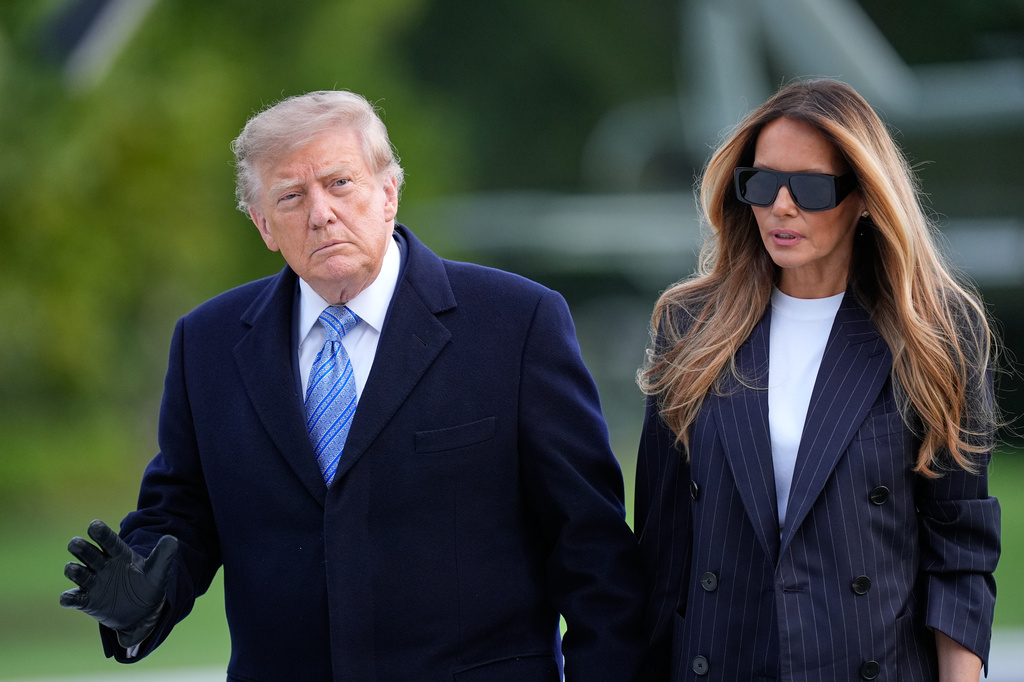 President Donald Trump and first lady Melania Trump arrive at the White House on Marine One, Wednesday, Sept. 23, 2026, in Washington, after greeting China's President Xi Jinping at Joint Base Andrews. (AP Photo/Manuel Balce Ceneta)