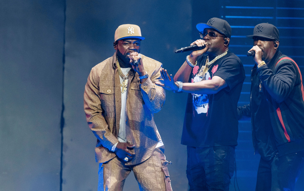 FILE - Rapper Curtis "50 Cent" Jackson, left, performs at the German launch of his "Final Lap Tour" at Hamburg's Barclays Arena in Hamburg, Germany, Friday, Sept. 29, 2023. (Markus Scholz/dpa via AP, File)