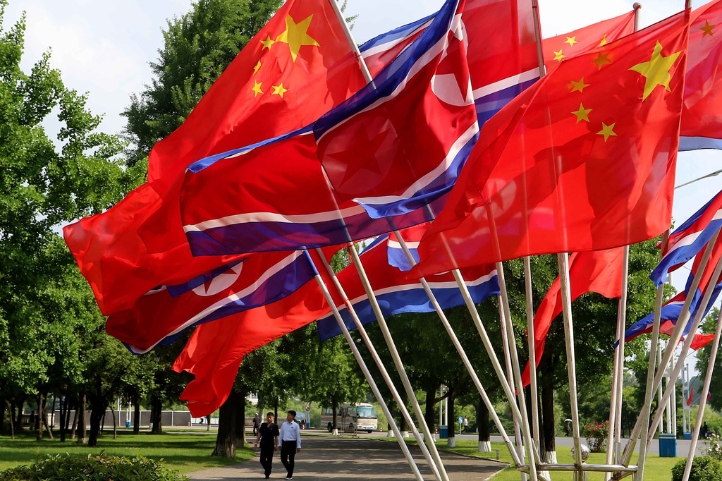 A street is decorated with the flags of China and North Korea in Pyongyang, on Monday, June 8, 2026. (AP Photo/Jon Chol Jin)