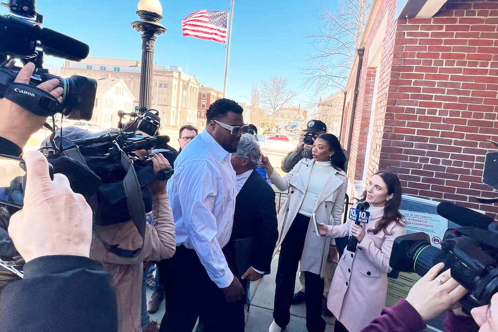 New England Patriots defensive lineman Christian Barmore arrives at Attleboro District Court for his arraignment on a domestic assault and battery charge Monday, March 9, 2026, in Attleboro, Mass. (AP Photo/Kimberlee Kruesi)