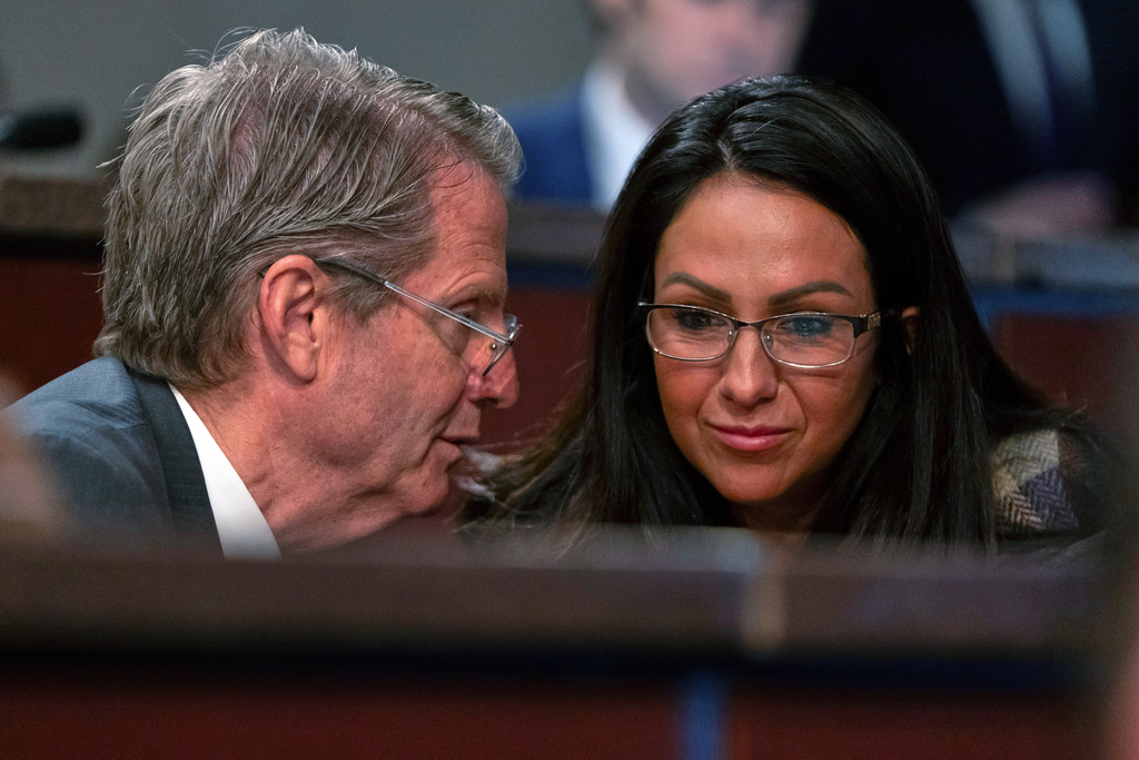 Rep. Tim Burchett, R-Tenn., left, speaks with Rep. Lauren Boebert, R-Colo., during a hearing of the House Committee on Oversight and Government Reform on Capitol Hill, Wednesday, Jan. 7, 2026, in Washington. (AP Photo/Mark Schiefelbein)