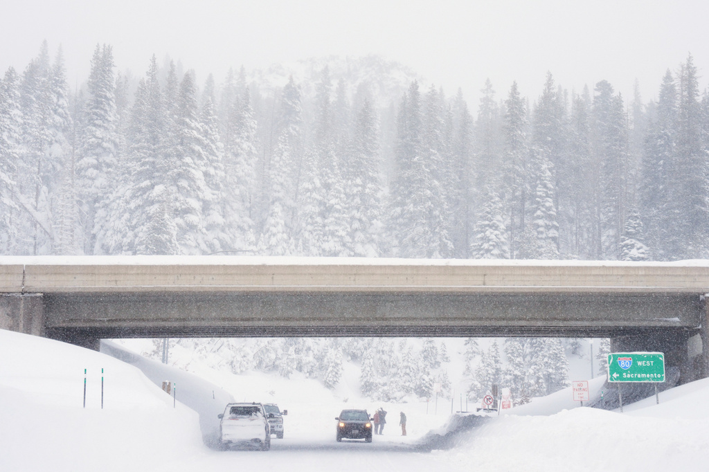 Snow covers a road on an underpass along interstate 80 on Wednesday, Feb. 18, 2026 near Soda Springs, Calif. (AP Photo/Brooke Hess-Homeier)