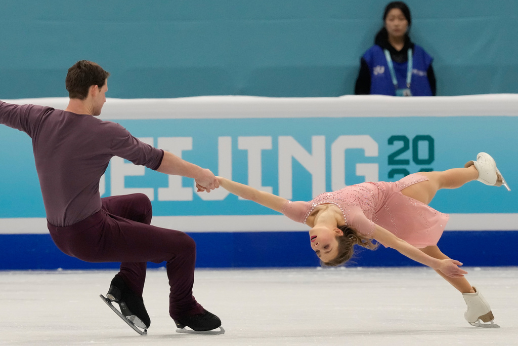 Alisa Efimova and Misha Mitrofanov of the United States compete in the Pairs Free Skating of the ISU Four Continents Figure Skating Championships in Beijing, China, Saturday, Jan. 24, 2026. (AP Photo/Vincent Thian)