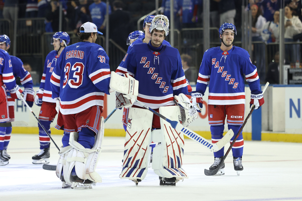 New York Rangers goaltender Igor Shesterkin, center, after an NHL hockey game against the Tampa Bay Lightning Thursday, Oct. 1, 2026, in New York. (AP Photo/Pamela Smith)