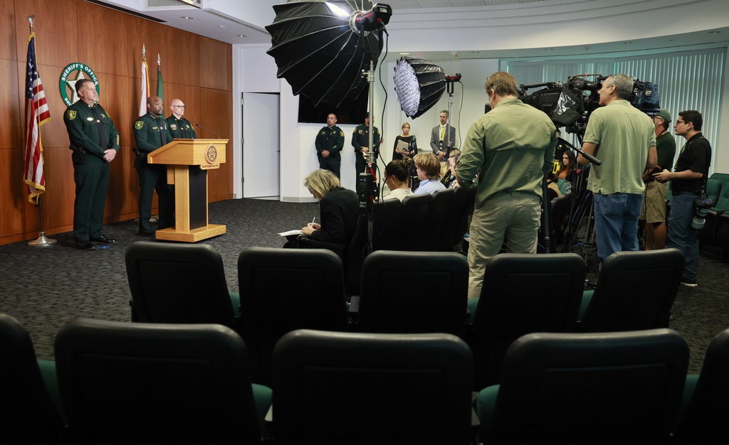 Broward Sheriff Gregory Tony and members of the Broward Sheriff's Office Internal Affairs Unit hold a news conference at the BSO Public Safety Building in Fort Lauderdale, Fla., on Friday, Sept. 12, 2025, about police misconduct in the Tamarac triple homicide case. (Mike Stocker/South Florida Sun-Sentinel via AP)