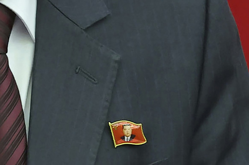 This photo provided Monday, July 1, 2024, by the North Korean government shows that a senior official wears lapel pins with the image of Kim Jong Un during a ruling party&rsquo;s meeting in Pyongyang Sunday, June 30, 2024. Independent journalists were not given access to cover the event depicted in this image distributed by the North Korean government. The content of this image is as provided and cannot be independently verified. (Korean Central News Agency/Korea News Service via AP)