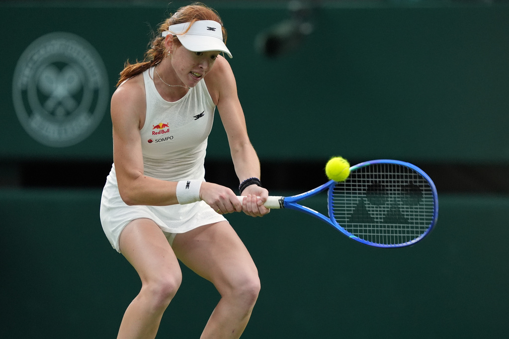 Maya Joint of Australia plays a backhand against Serena Williams of the United States in their first round women's singles match at the Wimbledon Tennis Championships in London, Tuesday, June 30, 2026. (AP Photo/Maja Smiejkowska)