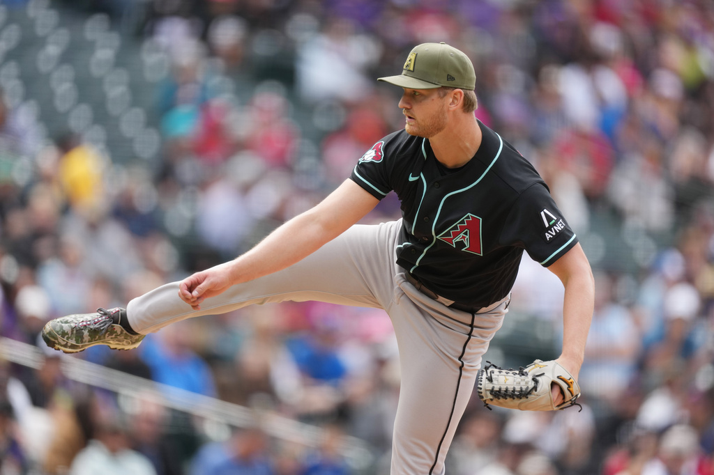 Arizona Diamondbacks starting pitcher Michael Soroka works against the Colorado Rockies in the first inning of a baseball game, Sunday, May 17, 2026, in Denver. (AP Photo/David Zalubowski)