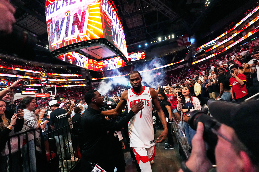 Houston Rockets forward Kevin Durant (7) leaves the court after winning an NBA basketball game against the Miami Heat in Houston, Saturday, March 21, 2026. (AP Photo/Ashley Landis)