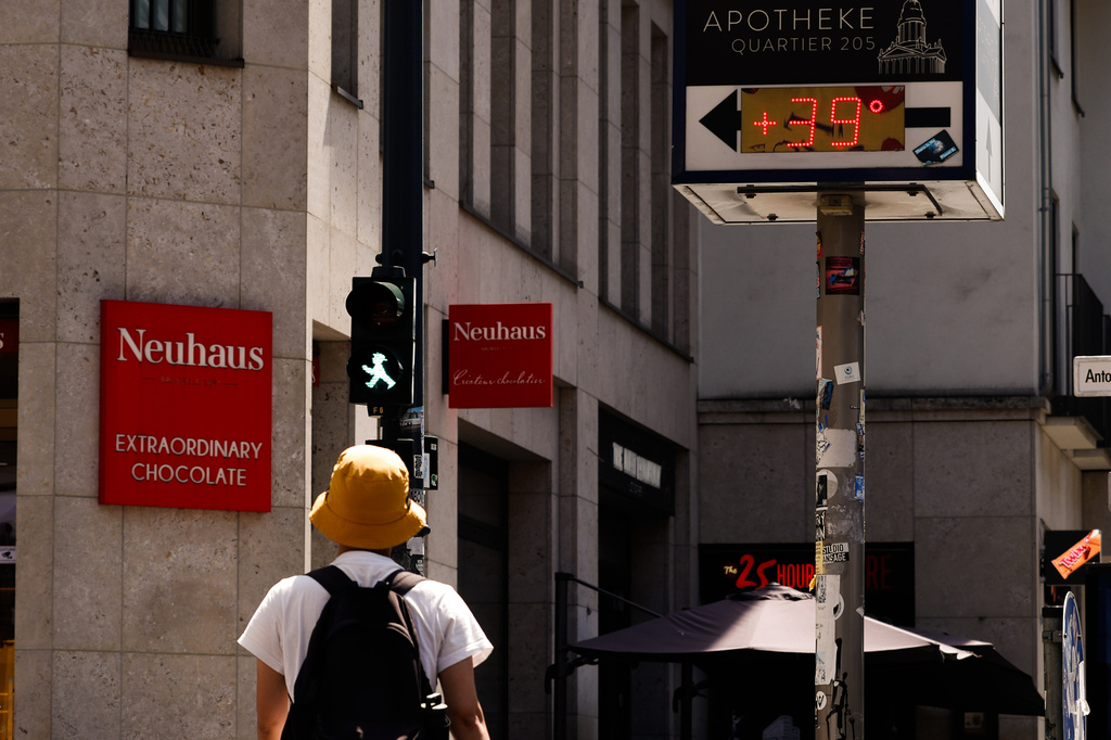 A view of a thermometer next to a pharmacy reading 39 degrees celsius, in Berlin, Saturday, June 27, 2026. (Carsten Koall/dpa via AP)
