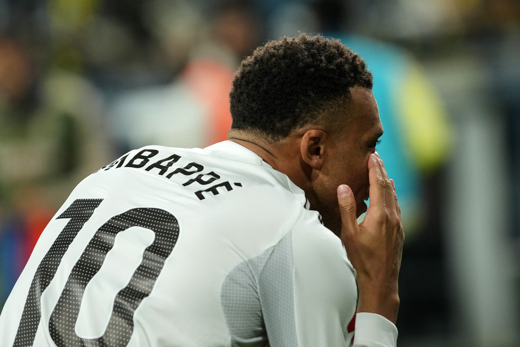 Real Madrid's Kylian Mbappe celebrates after scoring the opening goal during a Spanish La Liga soccer match between Villarreal and Real Madrid in Villarreal, Spain, Saturday, Jan. 24, 2026. (AP Photo/Alberto Saiz)
