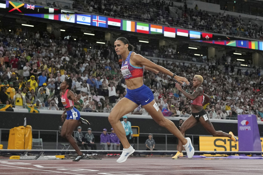 United States' Sydney McLaughlin-Levrone wins the women's 400 meters final at the World Athletics Championships in Tokyo, Thursday, Sept. 18, 2025. (AP Photo/David J. Phillip)