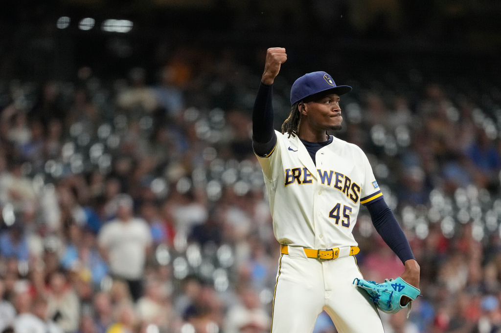 Milwaukee Brewers' Abner Uribe gestures during the eighth inning of a baseball game against the St. Louis Cardinals, Tuesday, May 26, 2026, in Milwaukee. (AP Photo/Aaron Gash)