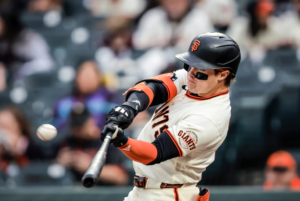 San Francisco Giants' Drew Gilbert (0) hits a solo home run against Arizona Diamondbacks’ Jose Cabrera (53) in the first inning of a baseball game at Oracle Park in San Francisco on Thursday, Aug. 27, 2026.(Carlos Avila Gonzalez/San Francisco Chronicle via AP)