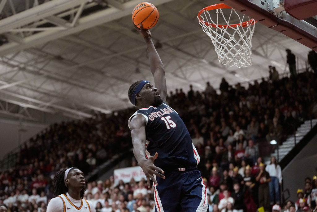 Gonzaga forward Graham Ike (15) dunks against Santa Clara during the first half of an NCAA college basketball game in Santa Clara, Calif., Saturday, Feb. 14, 2026. (AP Photo/Jeff Chiu)