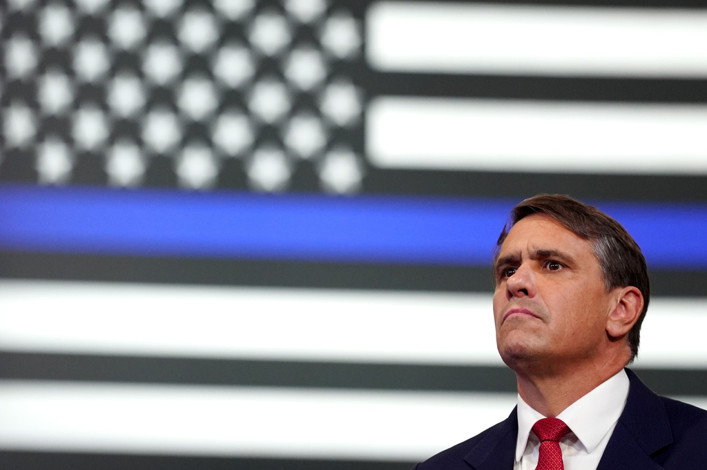 Attorney General Todd Blanche listens as President Donald Trump speaks at the David Mack Center for Training and Intelligence, Friday, Aug. 14, 2026, in Garden City, N.Y. (AP Photo/Julia Demaree Nikhinson)