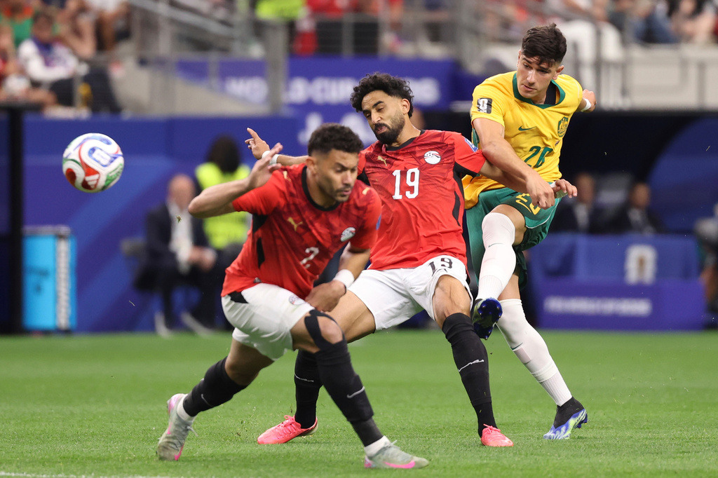 Australia's Cristian Volpato (20), right, tries to score as Egypt's Marawan Attia (19) tries to stop him during the World Cup round of 32 soccer match between Australia and Egypt in Arlington, Texas, near Dallas, Friday, July 3, 2026. (AP Photo/Sam Hodde)